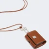Astuccio per auricolari in pelle, marrone ambra Astuccio per auricolari in pelle, marrone ambra