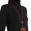 Astuccio per auricolari in pelle, marrone ambra Astuccio per auricolari in pelle, marrone ambra