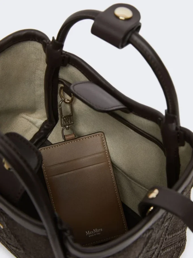 Borsa marina extra-piccola in intreccio a rombi, marrone scuro Borsa marina extra-piccola in intreccio a rombi, marrone scuro