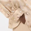 Camicia con fiocco in seta stampata, albino