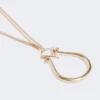 Collana con ciondolo monogramma, oro Collana con ciondolo monogramma, oro