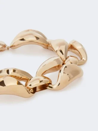 Collana in metallo dal design audace, color bronzo