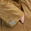 Giacca imbottita idrorepellente con cappuccio, color caramello