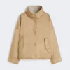 Giacca imbottita reversibile in tela idrorepellente, color nocciola Giacca imbottita reversibile in tela idrorepellente, color nocciola