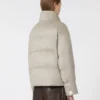 Giacca in tela idrorepellente e piumino color cammello, sabbia