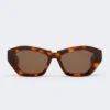 Occhiali da sole squadrati e audaci, color bronzo fulvo Occhiali da sole squadrati e audaci, color bronzo fulvo