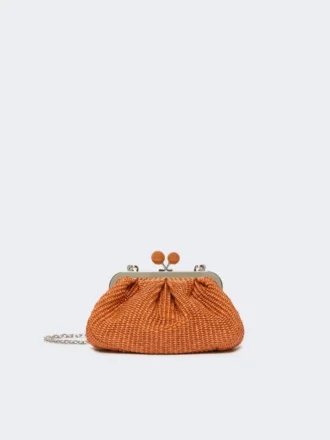 Piccola borsa a forma di pasticcino effetto rafia, color salmone