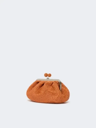 Piccola borsa a forma di pasticcino effetto rafia, color salmone