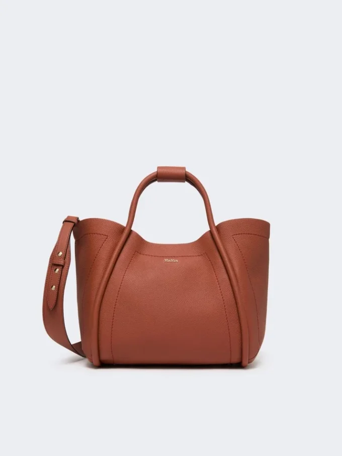 Piccola borsa in pelle stile marinaro, color ruggine Piccola borsa in pelle stile marinaro, color ruggine