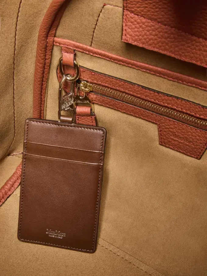 Piccola borsa in pelle stile marinaro, color ruggine Piccola borsa in pelle stile marinaro, color ruggine
