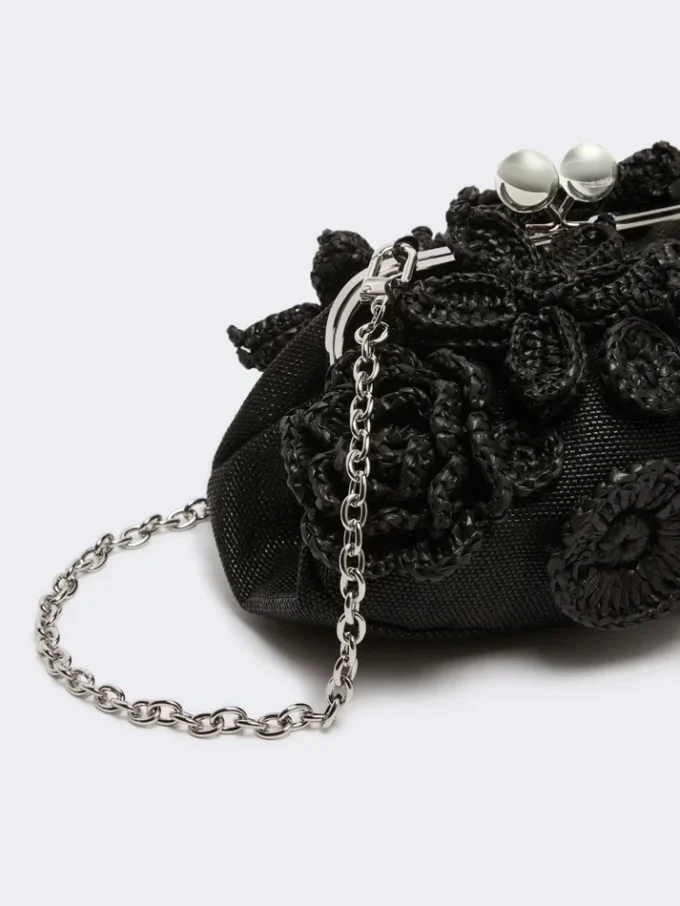 Piccola pochette a forma di pasticcino effetto rafia con fiori, nera Piccola pochette a forma di pasticcino effetto rafia con fiori, nera