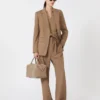 Polo in maglia a coste di lana, beige dorato e marrone