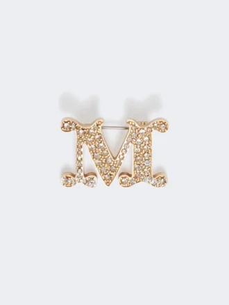 Spilla con monogramma impreziosita da cristalli, bianco ottico