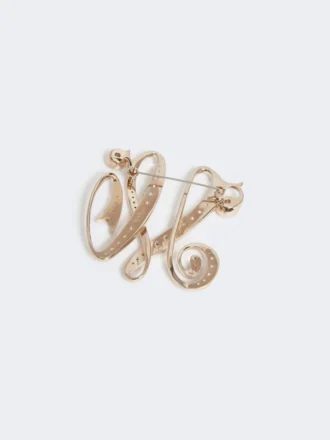 Spilla con monogramma in strass, avorio