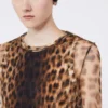 Top bimateriale con stampa animalier, sfumature beige Top bimateriale con stampa animalier, sfumature beige